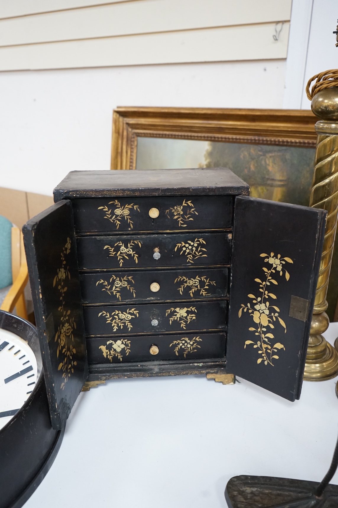 A mid 19th century Chinese export gilt-decorated lacquer two door cabinet, with five drawers, 38cm